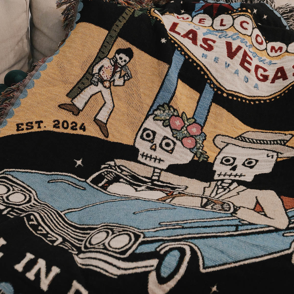 Personalized Las Vegas Skeleton Couple Blanket - Customizable wedding or anniversary gift, 100% cotton woven blanket with fringe, featuring a skeleton couple and Las Vegas theme, made in the USA